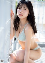 Wakana Sumino 隅野和奏, Weekly Playboy 2022 No.26 (週刊プレイボーイ 2022年26号) A woman in a blue bikini leaning against a wall.